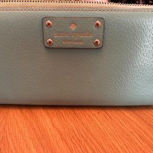 Kate Spade turquoise wallet with polka dot interior